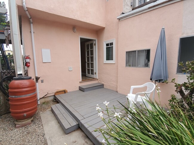your back porch, looks into the back garden - 663 Marine St Unit B
