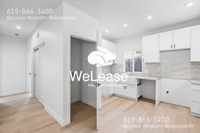 Building Photo - 5968 Carnegie St Unit 3