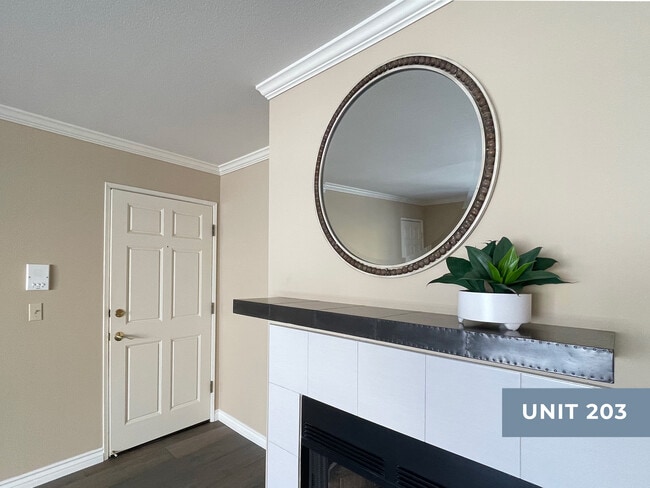 Cozy fireplace with BRAND NEW mantel & mirror - Hoffman Plaza Unit 203