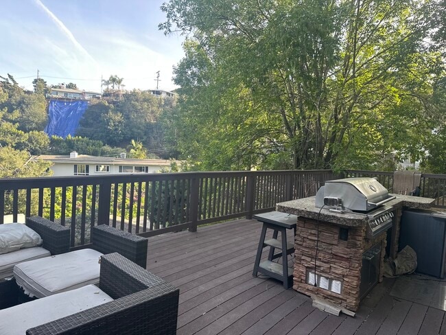 huge bbq deck area underneath - 2300 Sunset Heights Dr Apartment Unit david younesi