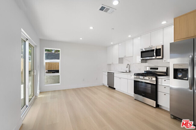 Building Photo - 10965 Calvert St Unit 2 Rental