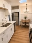 Remodeled kitchen with quartz countertops & stainless steel appliances - 1250 N Citrus Ave Unit Citrus home sweet home