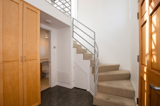downstairs closet, bathroom, stairs to mezz. - 3016 Ruskin St Unit rear