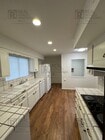 Photo - Spacious 3-Bedroom Home with Sunroom & Upg...