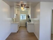Kitchen with Oven and Microwave - 13401 Victory Blvd Unit #8