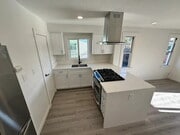 Photo - Located on a large lot, along with only four other cottage units, sits this 2 bedroom 1 bath unit