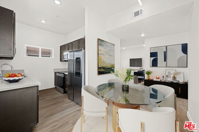 Building Photo - 7411 Artesia Blvd Unit 201 Rental