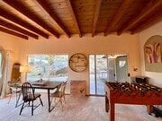 Fooseball table next to patio - 8080 Sunset Rd