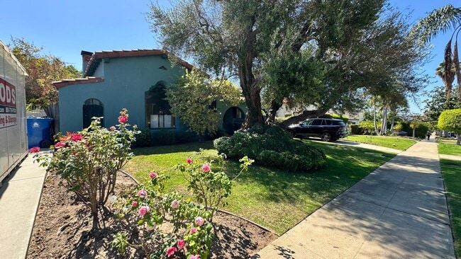 Building Photo - Beautiful Spanish Style Home with Lush Yard