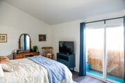 Balcony and tall walls in primary bedroom - 11120 Moorpark St Condo Unit #3