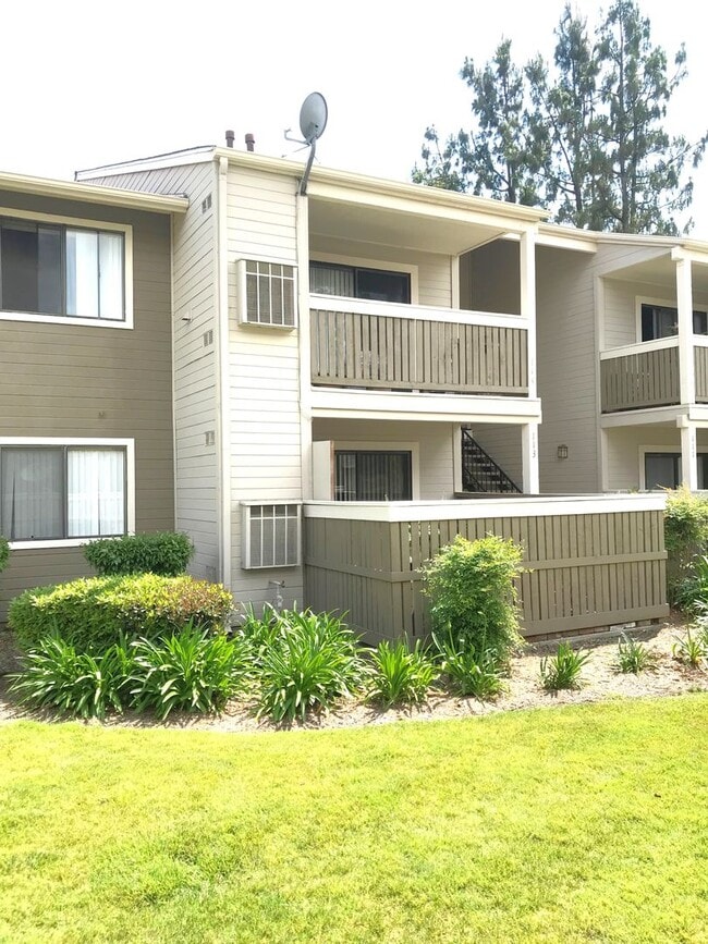 Building Photo - Ground Level 2 Bedroom Condo with Private Patio in Gated Community for Lease