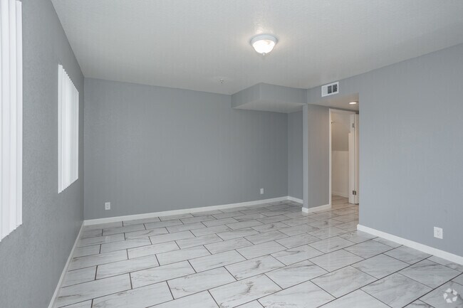 2BR, 2BA - 900SF - Living Room - Emerald Terrace Apartments