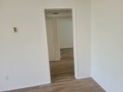 Hallway to bedrooms and tub bath - 21030 Ladeene Ave Unit B