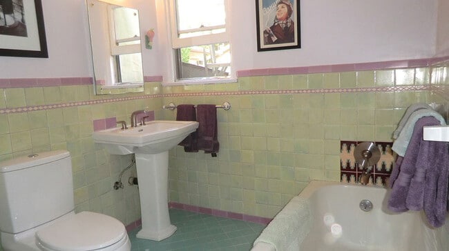 bathroom with tub and shower - 3253 La Clede Ave