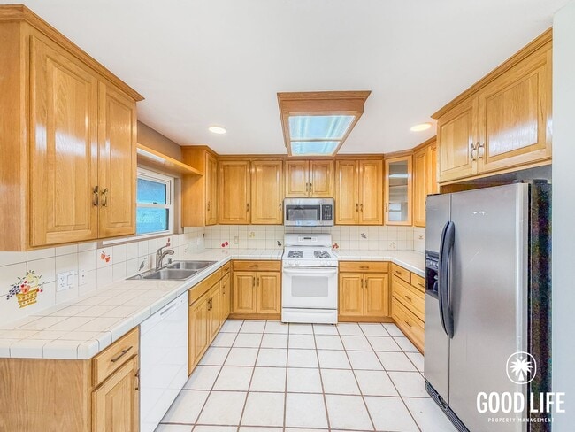 Photo - 2BD/1BA Home in La Mesa with Turf Yards, Large Backyard, W/D & 2-Car Garage