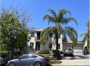 Front of house with shared yard/driveway. Right side of driveway/garage is for upstairs tenant - 1733 Phillips Way