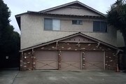 Front of building. 2 tandem parking spots. - 3112 S Durango Ave Unit 2