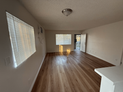 Living Room / Front Door - 525 Jacmar Dr Apartments Unit B