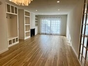 Living Room with Fireplace & Built - 6467 Kanan Dume Rd Unit 6467 Cavalleri Road