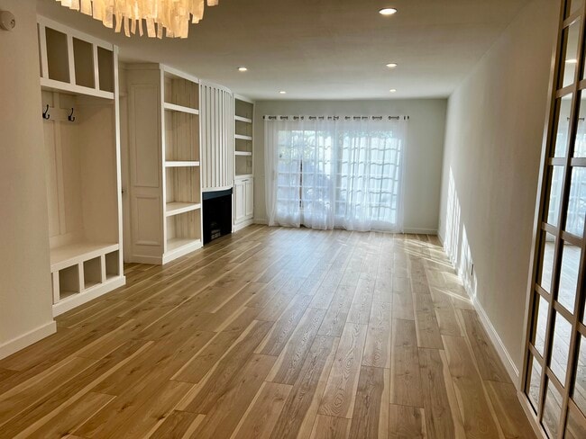 Living Room with Fireplace & Built - 6467 Kanan Dume Rd Unit 6467 Cavalleri Road