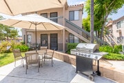 Grill Area - The Village at Lakeside (55+ Community) Apartments
