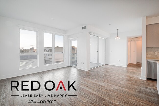 Building Photo - 1168 S Barrington Ave Unit 401