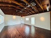 Photo - Spacious One Bedroom + Den Backhouse! In Unit Laundry! Prime Location!