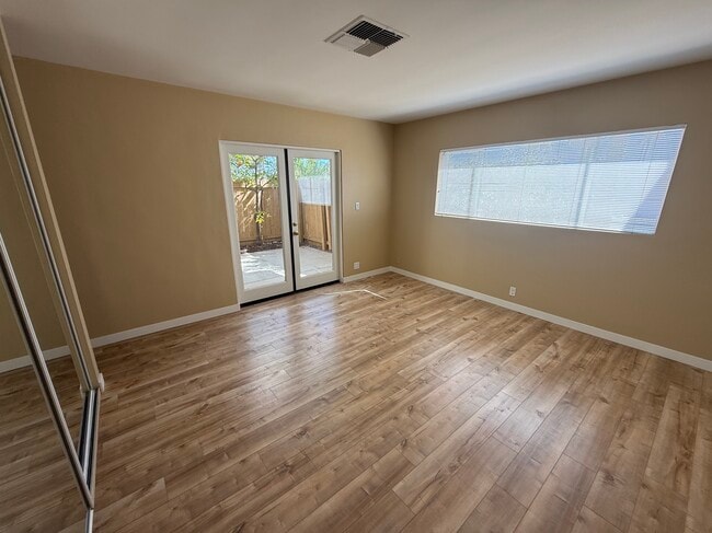 Master bedroom has French doors leading to a private patio, and en suite bathroom. - 1450 E Granvia Valmonte
