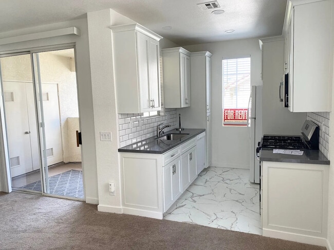 Photo - 10884 Sabre Hill Dr Unit 308