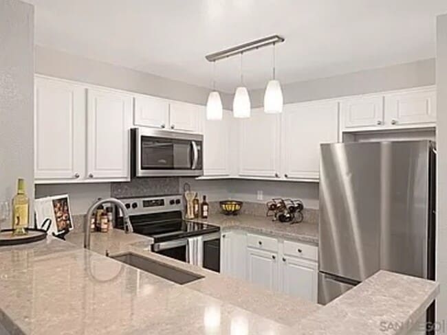 Building Photo - 3440 Lebon Dr Unit 4104