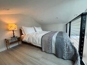 queen sized bed in sleeping loft - 3744 Granada Ave House