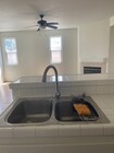 Fireplace in kitchen - 3141 Thoroughbred St House