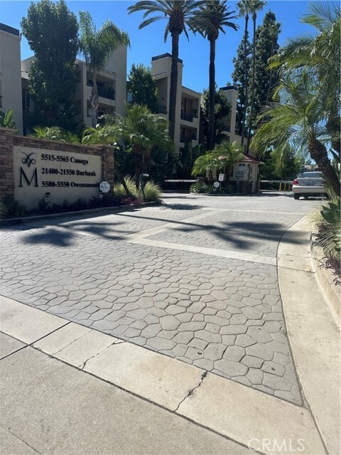 Building Photo - 5525 Canoga Ave Unit 212