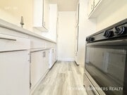 Photo - 1088 W 39th St Unit 11