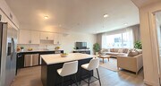 A Dining and Living Area Photo at The MIX - The MIX Luxury Apartments