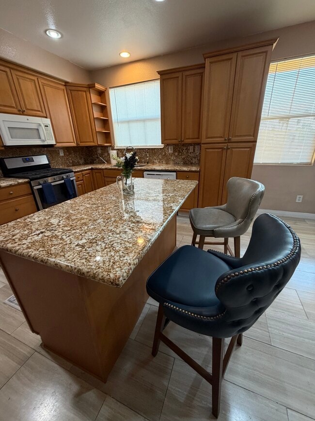 kitchen island with barstools - 1860 E 12th St