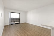 Spacious living rooms designed for comfort and style. - The Hills at Fashion Valley