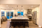 Cook with ease in the fully equipped kitchen featuring a 6-burner stove, essential utensils - 5506 Malachite Ave House