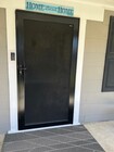 New security screen door - 22025 Galvez St House
