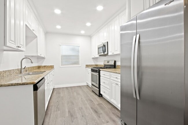 Photo - 3 bed 2 bath fully renovated apartment near Huntington Harbour Unit 16842 Hoskins Ln. A