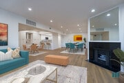 Open-Concept Kitchen, Dining, and Living Room Space - Rose Flower by Wiseman Apartments