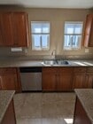 Stainless steel kitchen appliances with ample cabinet storage - 4828 Sawtelle Blvd House