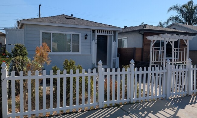 Enclosed front yard with drought-tolerant landscaping - 4828 Sawtelle Blvd House