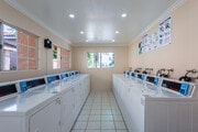 Laundry Room-Smart Machines with Real Time App - South Coast Fountains