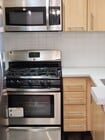 Stainless steel appliances in kitchen - 7037 La Tijera Blvd Condo Unit A101