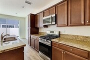Photo - Spacious 4-Bedroom Home with Private Yard ...
