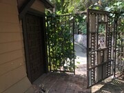 gated entry - 1942 Orchard Ave House