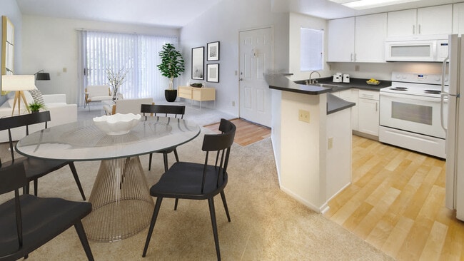Kitchen and Carpeted Living Room with Balcony - Siena Terrace
