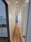Long hallway leading to bathroom and rooms - 2109 1/2 W 54th St Apartments Unit 2109 W 54th