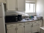 Kitchen with granite countertop - 2639 Dobinson St Apartments Unit B